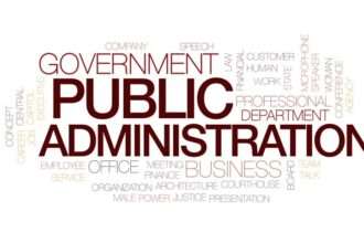 A diverse group of public administration professionals collaborating on a project