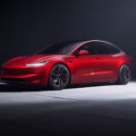2026 Tesla Model 3 Exterior in Ultra Red showing new bumper camera