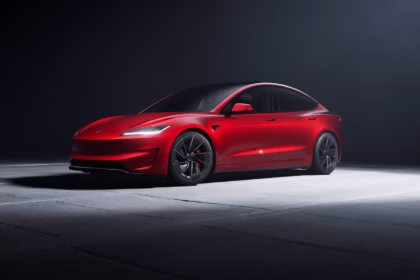 2026 Tesla Model 3 Exterior in Ultra Red showing new bumper camera