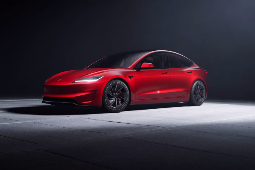 2026 Tesla Model 3 Exterior in Ultra Red showing new bumper camera